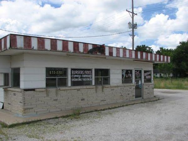 You stumble haphazardly into an abandoned burger shack. You notice a burger on a seemingly clean plate on the dusty counter. It is just about two feet to your left, what do you do?