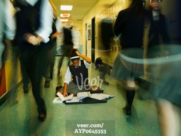 Your friend trips over you and her books all go flying. What do you do?