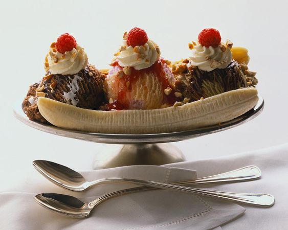 You are sharing a banana split when you notice he has some on his mouth. What do you do?