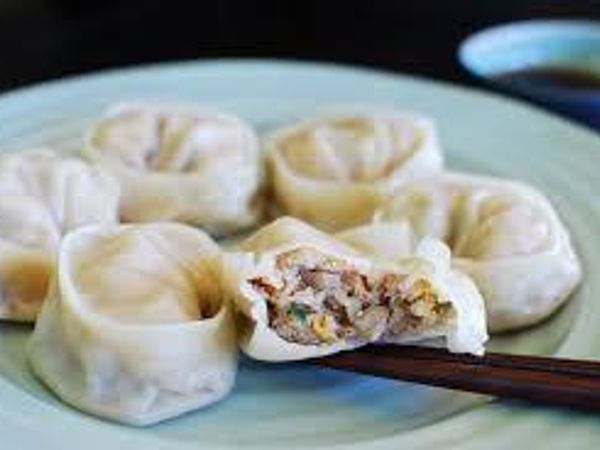 "Mandu are dumplings in Korean cuisine. Mandu can be steamed, boiled, pan-fried, or deep-fried. The styles also vary across regions in Korean Peninsula." Wikipedia.