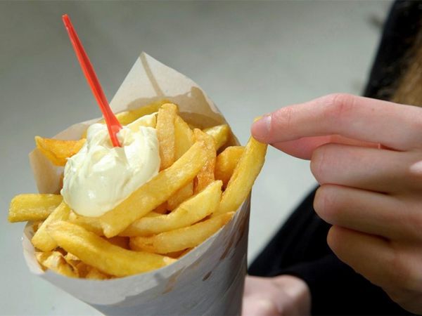 Fries with mayonnaise  Let me be honest, I don't eat many of the food these questions have. But this and hagelslag? THEY ARE PART OF ME