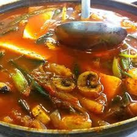 "Maeun-tang or spicy fish stew is a hot spicy Korean cuisine fish soup boiled with gochujang, kochukaru, and various vegetables."  Wikipedia.