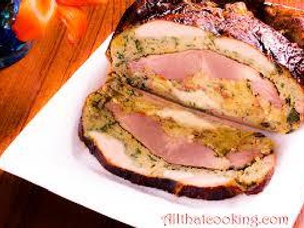 "Turducken is a dish consisting of a deboned chicken stuffed into a deboned duck, further stuffed into a deboned turkey. Outside of the United States and Canada, it is known as a three bird roast."  Wikipedia