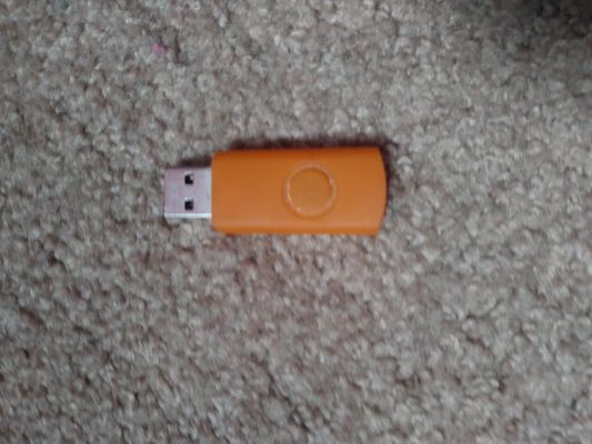 I found a weird flash drive when i was cleaning my desk. It had files from 2010 and 2013. Should i tell my mom that i found it?