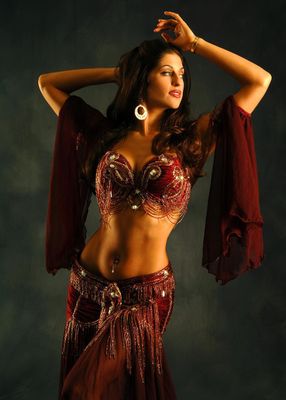 Do you ever practice belly dancing? Belly dance takes many different forms depending on the country and region, both in costume and dance style, and new styles have evolved in the West as its popularity has spread globally. 