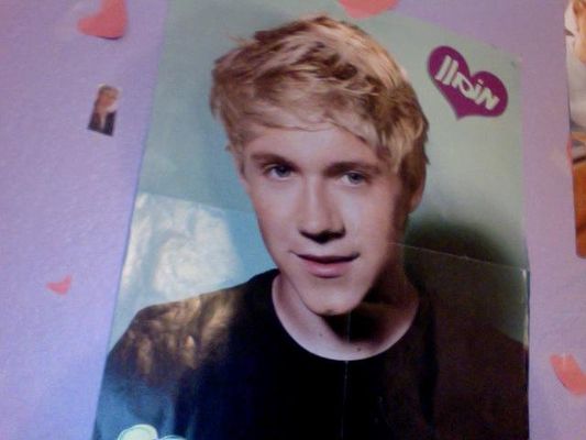 Am I Obsessed with one direction? I have 18 posters of them. I talk about them all the time. Do you think I am obsessed?