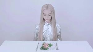 Poppy eats a meal