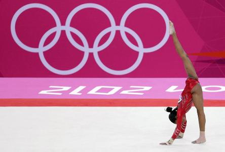 Who is the only gymnast to be awarded a perfect score of 10 in the Olympics?