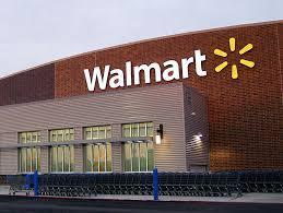 What major retail corporation did Walmart acquire in 1999?