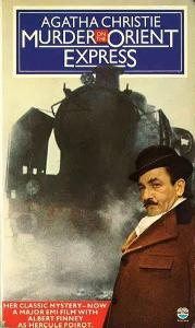 Which novel involves a murder on a train and a famous detective with a fabulous mustache?