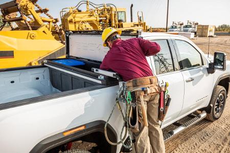 Which material is commonly used for durable truck bed storage boxes?