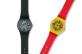 Which type of watch was the Swatch created to compete with?