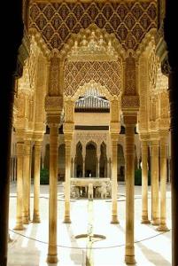 Which city is known for its magnificent Islamic architecture in the form of the Alhambra?