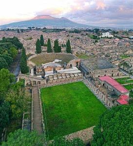 Which volcano famously buried the city of Pompeii in 79 AD?