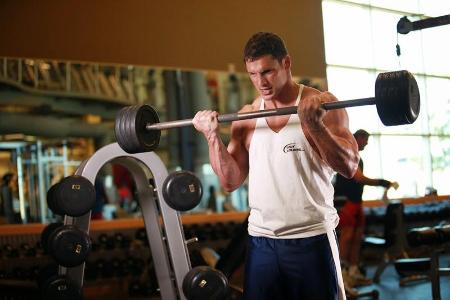 How often should you progressively overload your muscles in strength training?