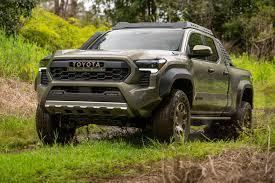 Which Japanese manufacturer produces the Tundra and Tacoma trucks?