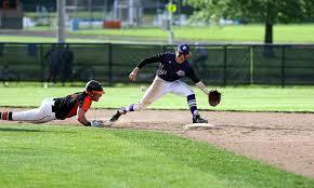 During fielding practice, what position is emphasized for proper ground ball technique?