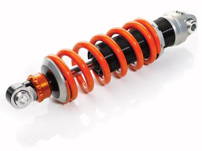 What is the purpose of shock absorbers in a truck lifting kit?