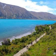 What is a frequently highlighted feature of the Alps 2 Ocean trail in New Zealand?