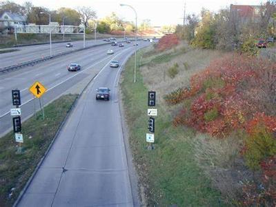 What is the purpose of ramp meters on highway entrance ramps?