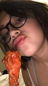 What Sauce does ashley like to eat her wings with?
