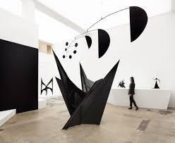 What material did Alexander Calder primarily use for his sculptures?