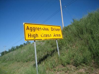 If an aggressive driver tries to cut you off, you should...