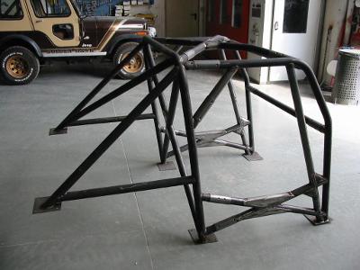 What is the purpose of a roll cage in off-road trucks?