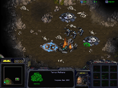 Which game features the factions Terran, Protoss, and Zerg?