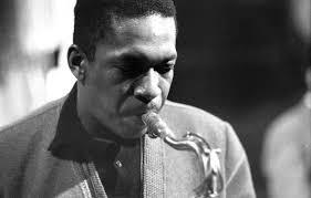 Which jazz artist is known for 'A Love Supreme'?