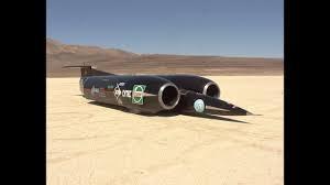 Which car broke the sound barrier to set a new land speed record?