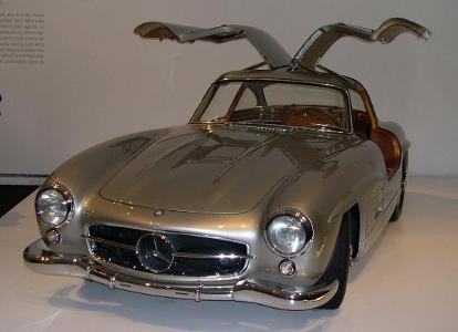 Which classic car features gull-wing doors and was produced from 1954 to 1963?