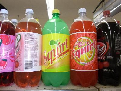 What is the main citrus flavor in Squirt soda?