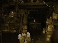 Can anyone tell me what i'm suppose to look at? I cant find it :P I'm trying to find what is wrong with this picture (besides the crying girl) but I cant find what makes this pic supposedly scary please help and thank you :P