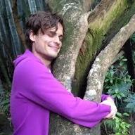 Who Is This Celebrity? who is this strange gentelman hugging a tree?