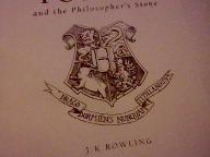 What does "Draco Dormiens Nunquam Titillandus" mean? I was wondering what it meant because it is written at the beginning of every Harry Potter book.