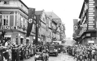 When you think of Nazi Germany, what is the first word you think of? For school I am writing paper and so I am conducting a poll.