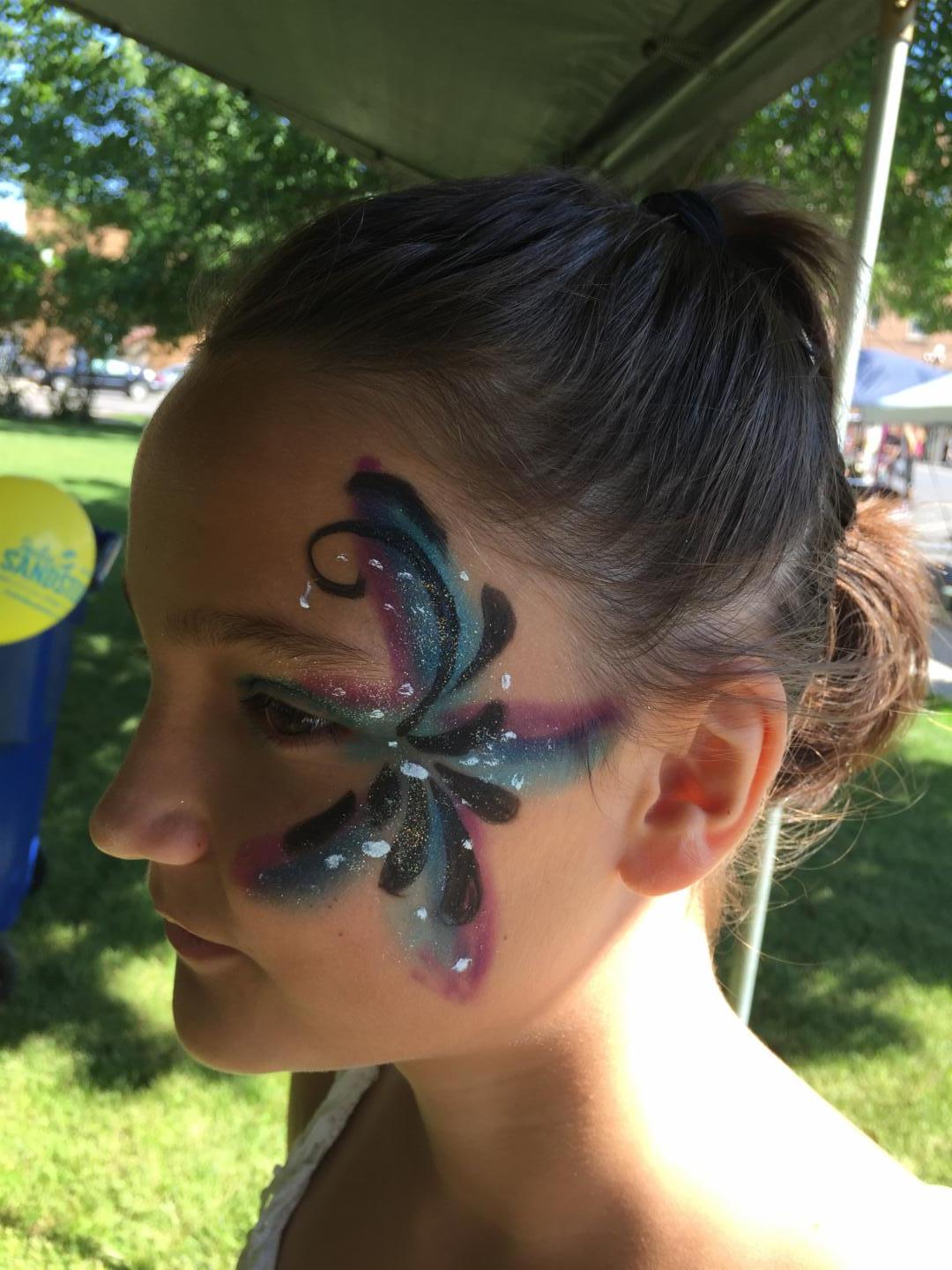 The kids carnival I got my face painted :D