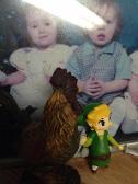 A rooster sculpture, my Tiny Toon Link, and my cousins baby pictures... Ok then. XD